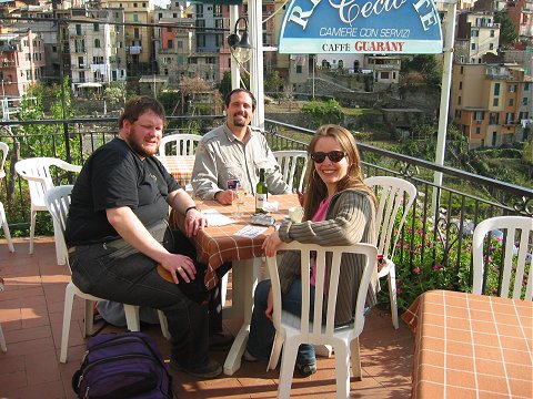 Speedy, me and Kelli at a restaurant in Corniglia